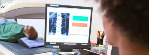 A person running a bone scan to check heart health