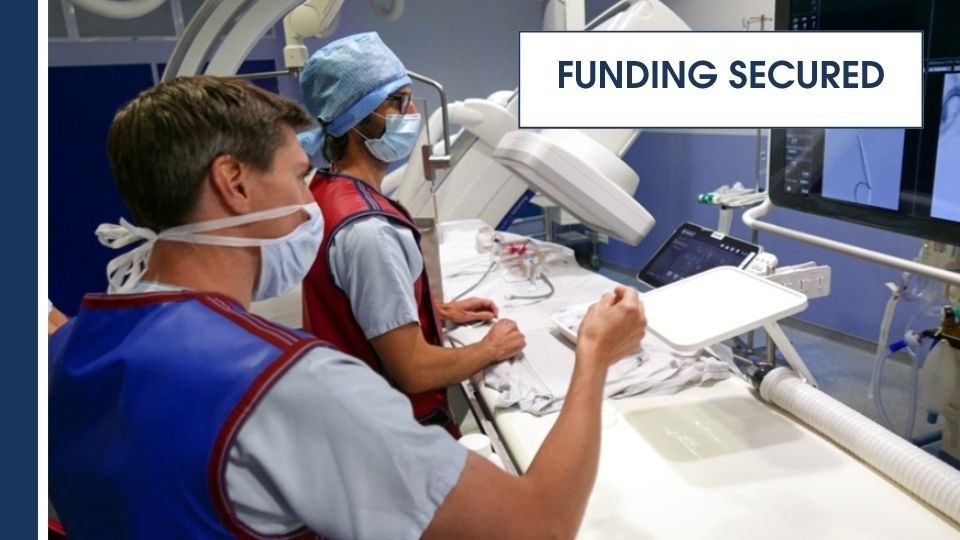 A doctor using technology to conduct heart research