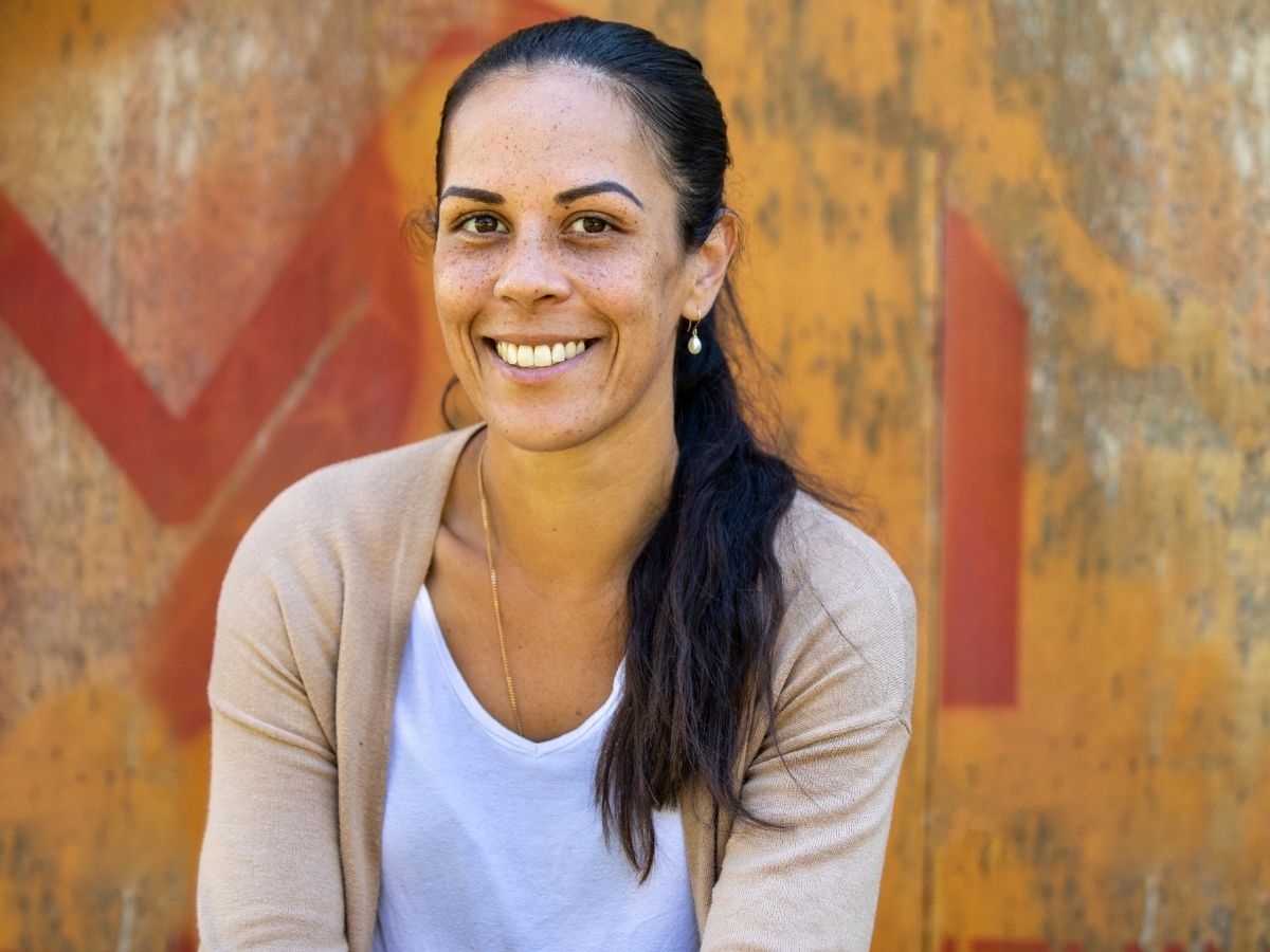 A First Nations woman smiling at the camera