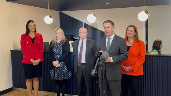 Health Minister Mark Butler announcing the three-year extension to the Medicare Heart Health Checks, supported by Heart Foundation CEO David Lloyd.