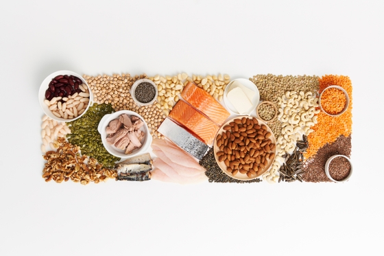 A colorful assortment of food in bowls, showcasing a diverse range of culinary delights.