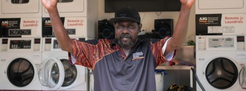 A man standing in a Remote Laundriy